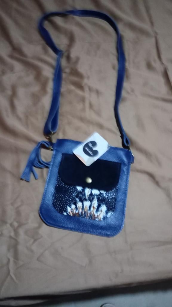 Handtas te koop, Ophalen