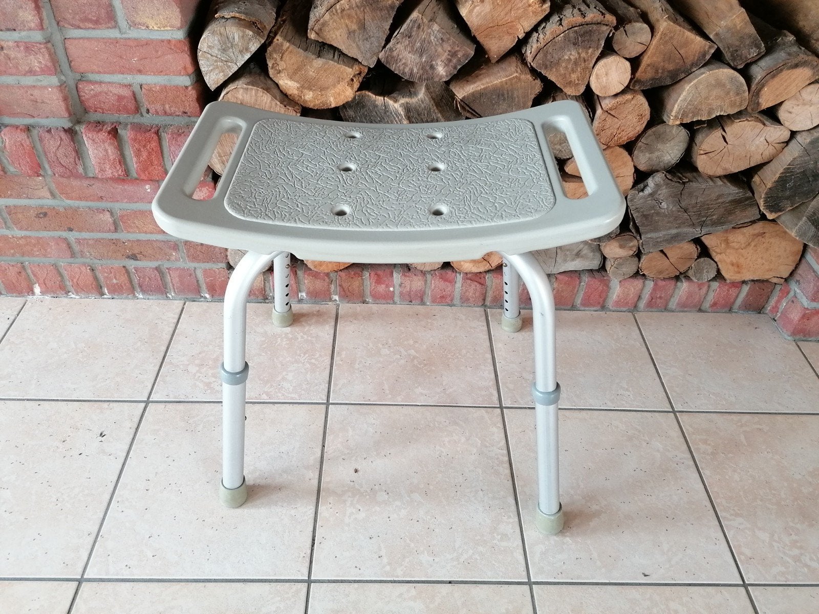Douchestoel, Ophalen