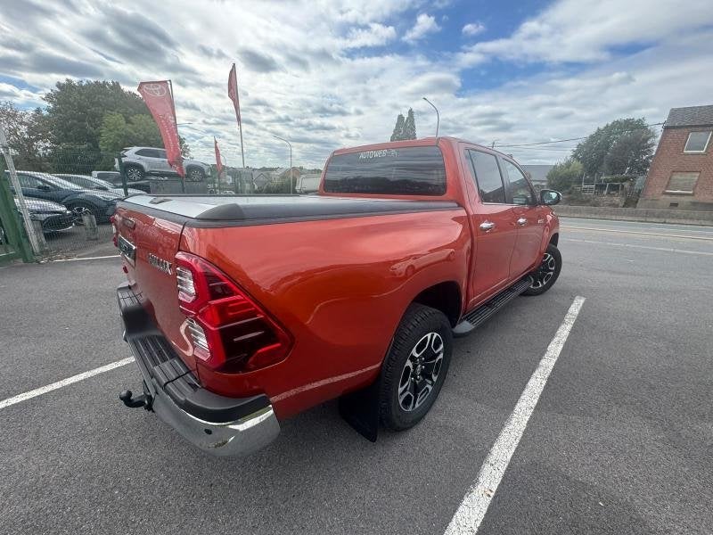 Toyota Hilux Double Cab 2.8 204hp 6AT Lounge, Autos, Ordinateur de bord, Achat, Autres couleurs, Noir