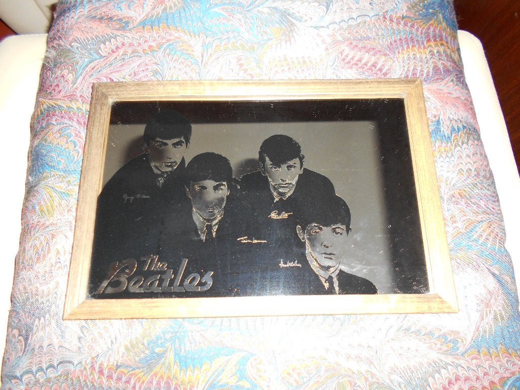 cadre miroir beatles, Enlèvement