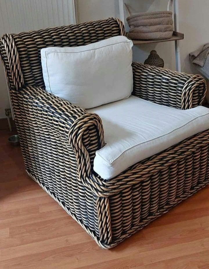 Stevige fauteuil van geweven rotan, Ophalen