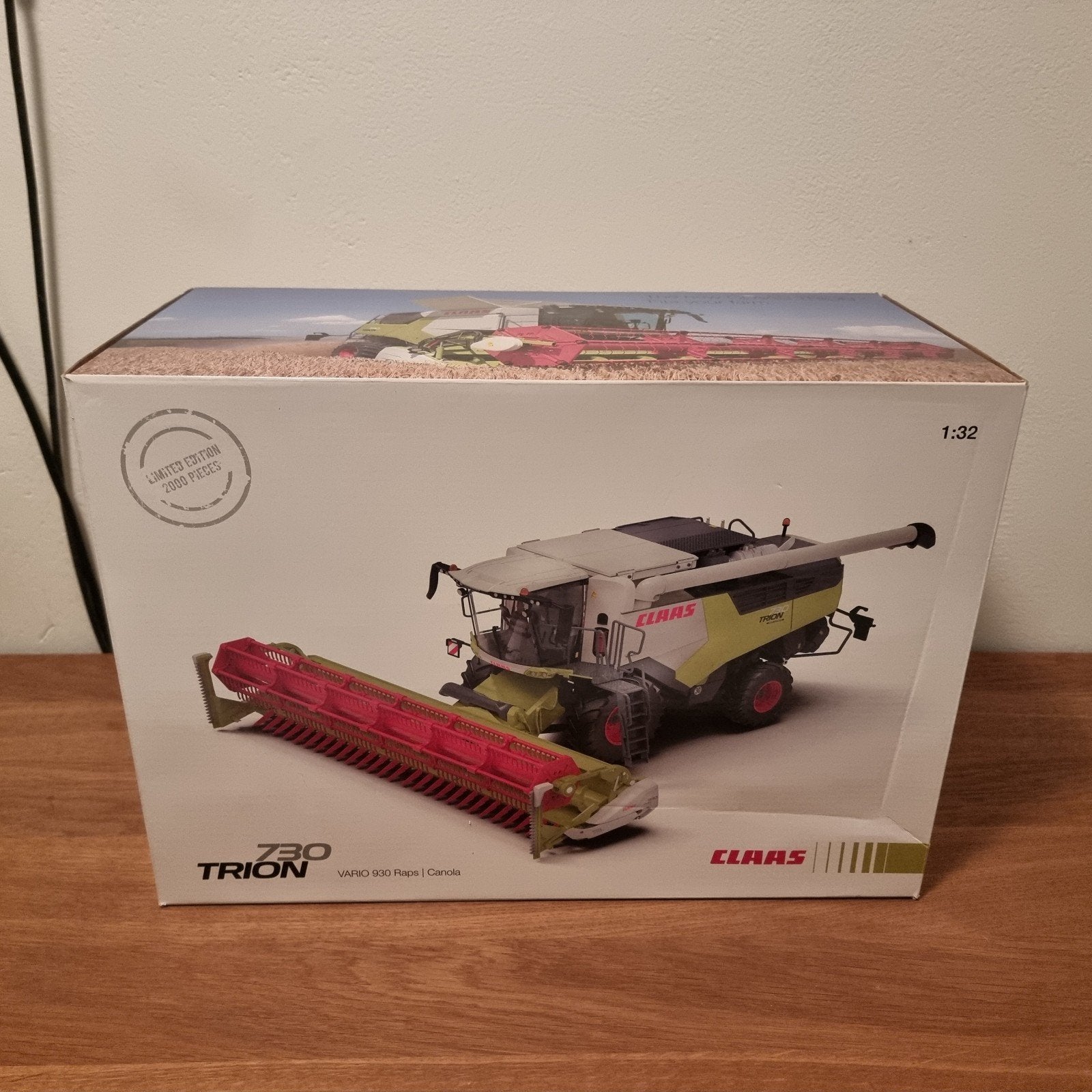 Claas Trion 730 + Vario 930 Raps Wiking, Hobby en Vrije tijd, Modelauto's | 1:32, Ophalen of Verzenden, Zo goed als nieuw, Tractor of Landbouw