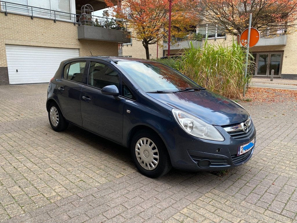 Opel Corsa 5-deurs Benzine Lez 2030, Auto's, Euro 4, Zilver of Grijs, Corsa, Testrit aan huis