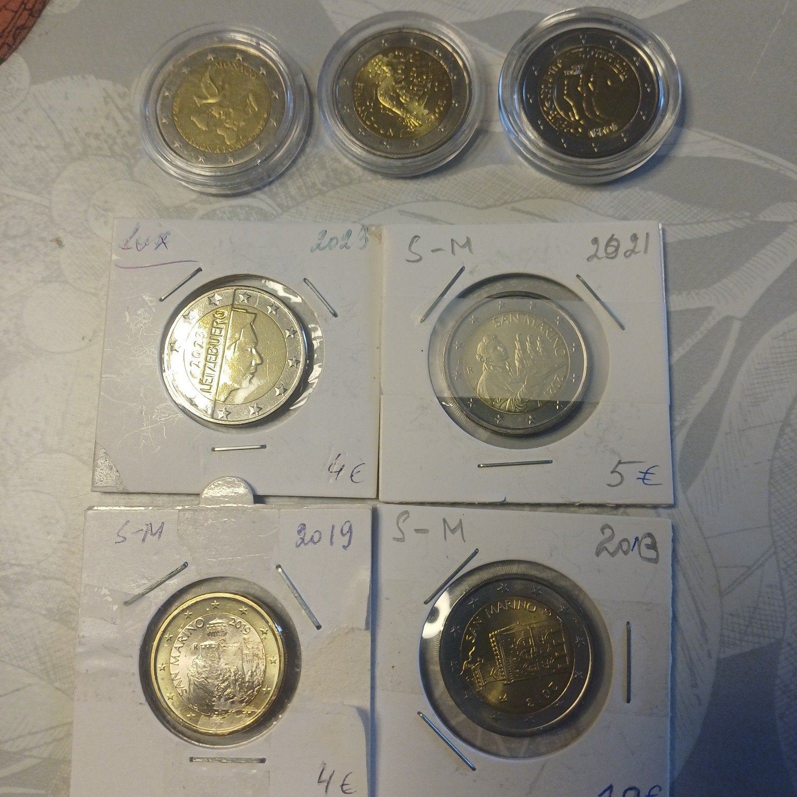7 munten van 2€, Ophalen