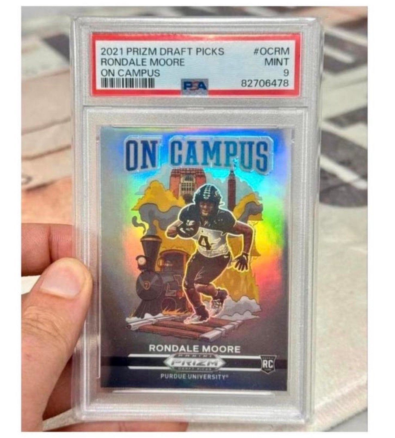 2021 PRIZM DRAFT PICKS RONDALE MOORE ON CAMPUS panini PSA-9, Ophalen of Verzenden, Zo goed als nieuw, Spelerskaart