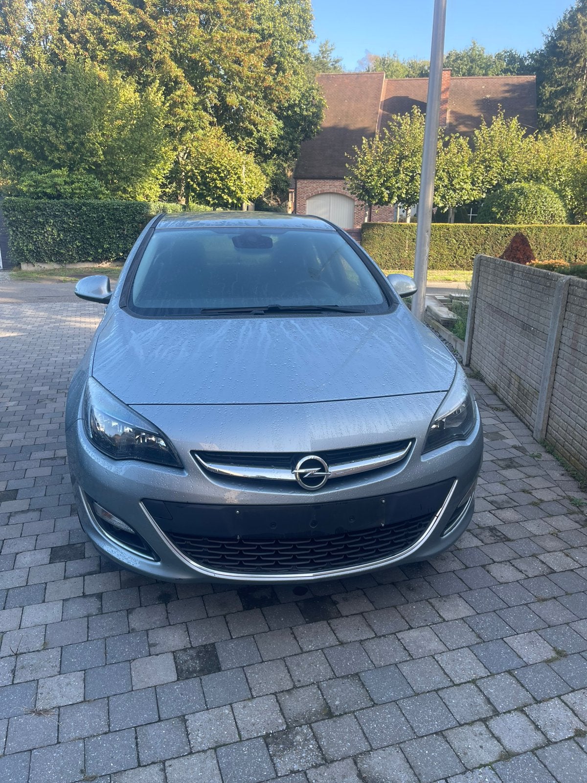 Opel Astra 1.6 Benzine, Auto's, Voorwielaandrijving, Euro 5, 4 cilinders, Leder en Stof