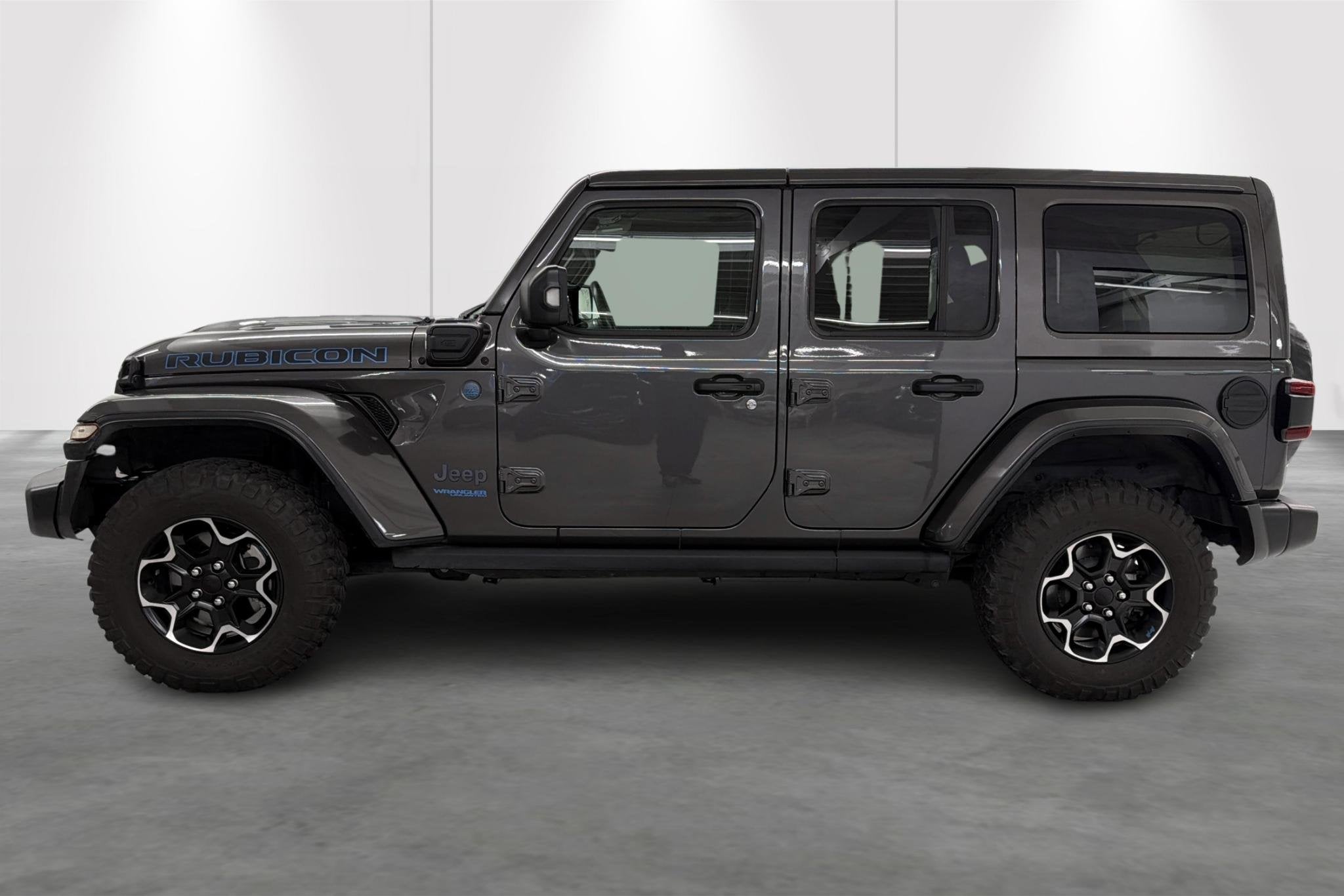 Jeep Wrangler Unlimited 2.0 4xe PHEV 380hp 4WD AT8 Rubicon, Auto's, Jeep, Automaat, Automatische klimaatregeling, Stof, Gebruikt