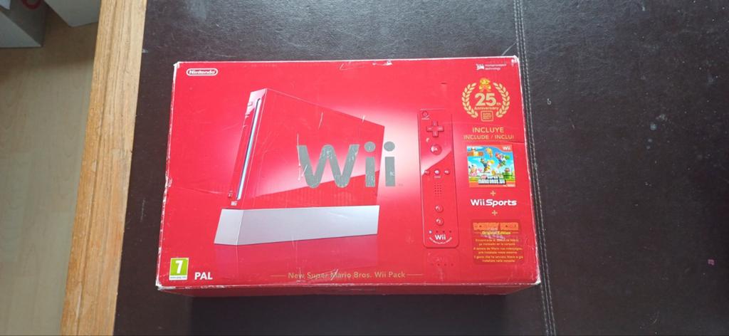 Wii rouge complète dans une boîte avec 2 jeux, Enlèvement, Utilisé