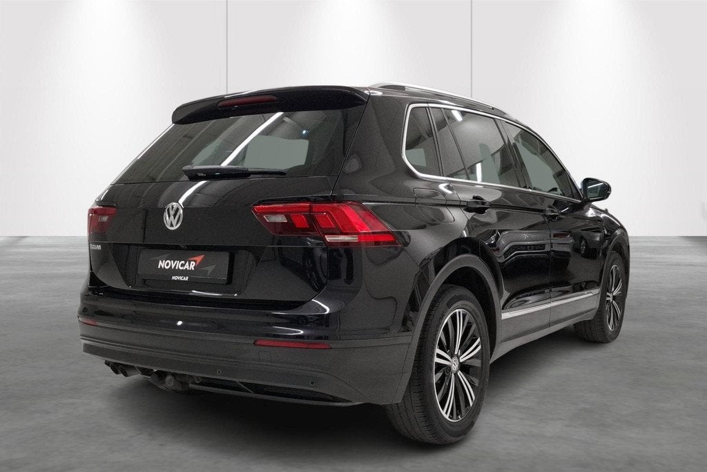 Volkswagen Tiguan 1.4 TSI 92kW Trendline, Auto's, Voorwielaandrijving, Gebruikt, 4 cilinders, Zwart