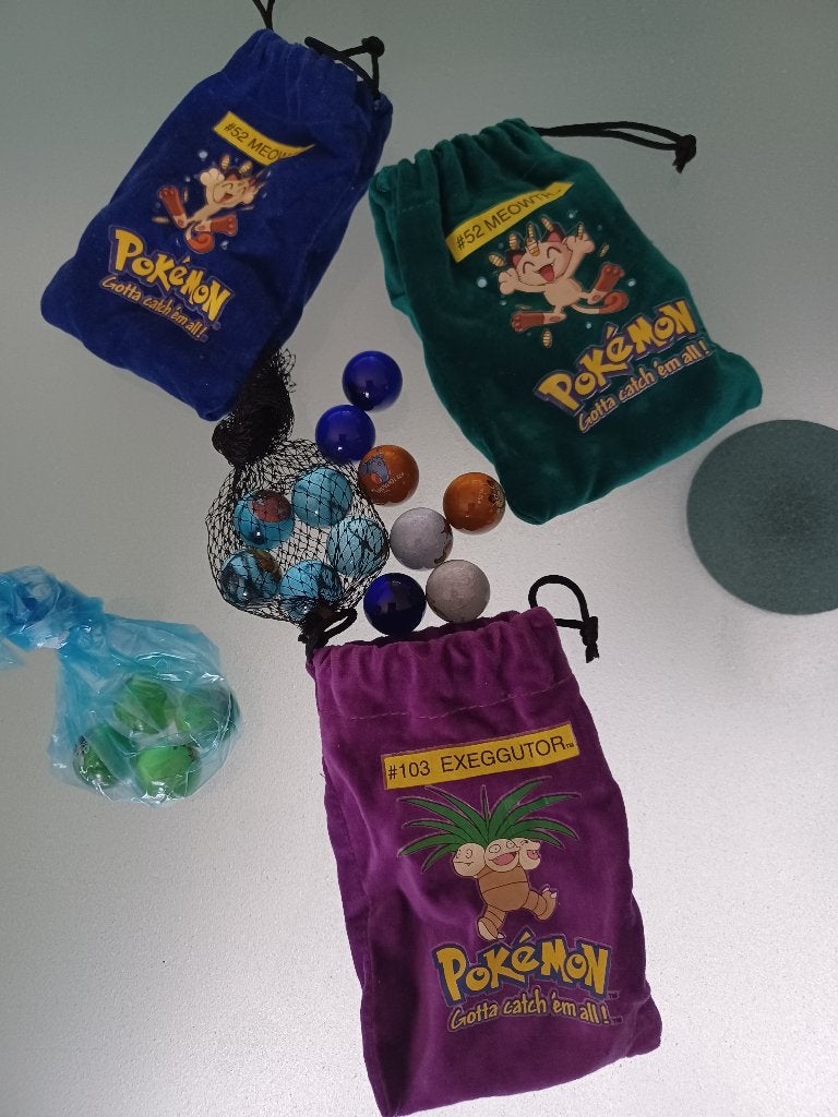 knikkers pokemon, Ophalen, Zo goed als nieuw