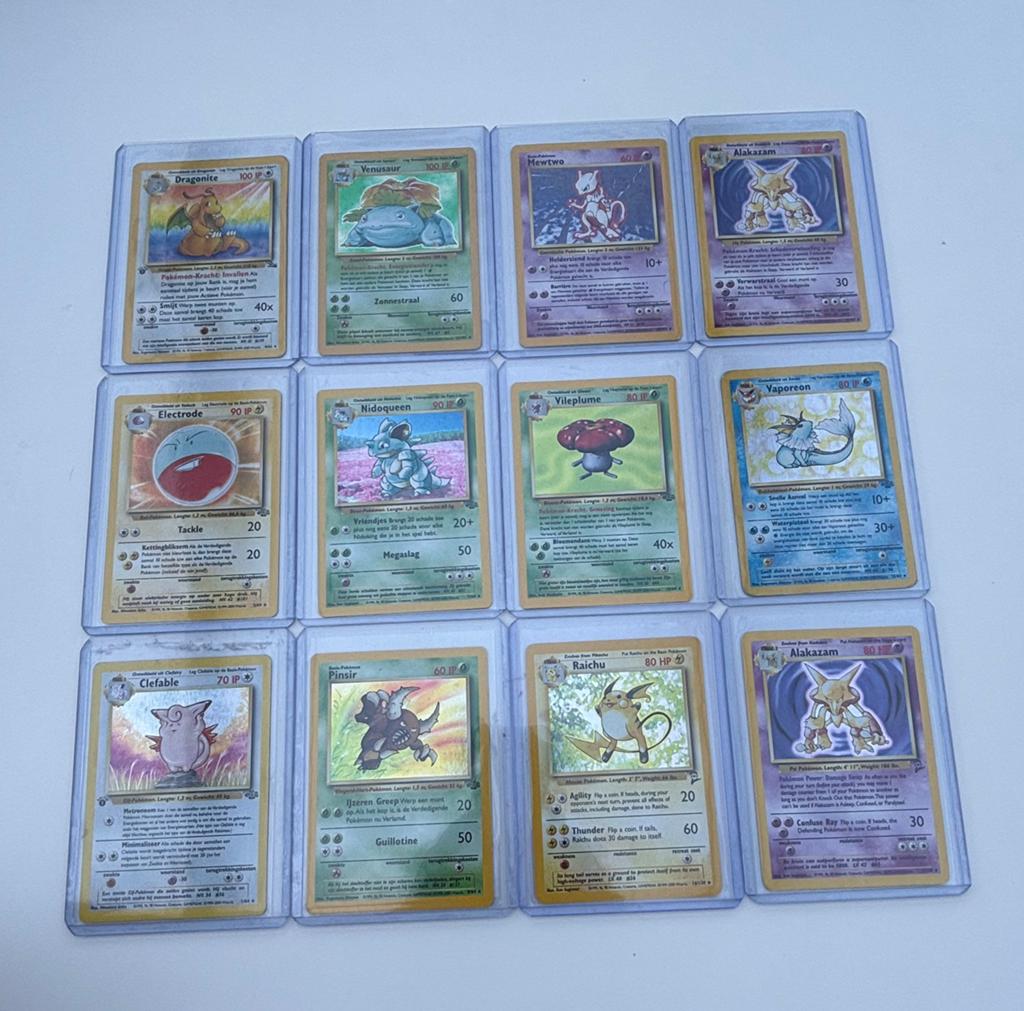 Pokemon base/jungle/fossil holo’s nederlands, Ophalen of Verzenden, Zo goed als nieuw