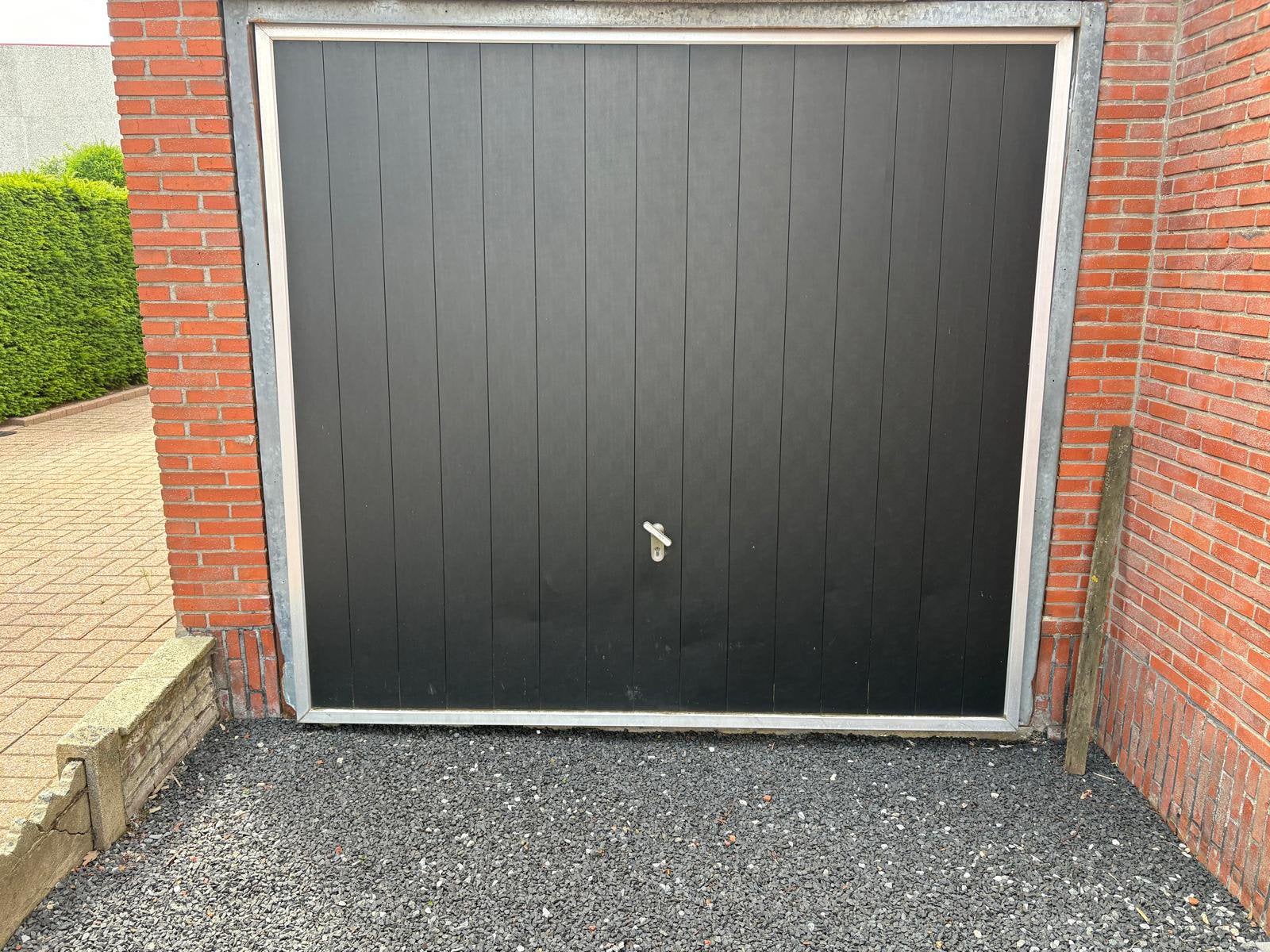 Gratis garagepoort met afstandsbediening