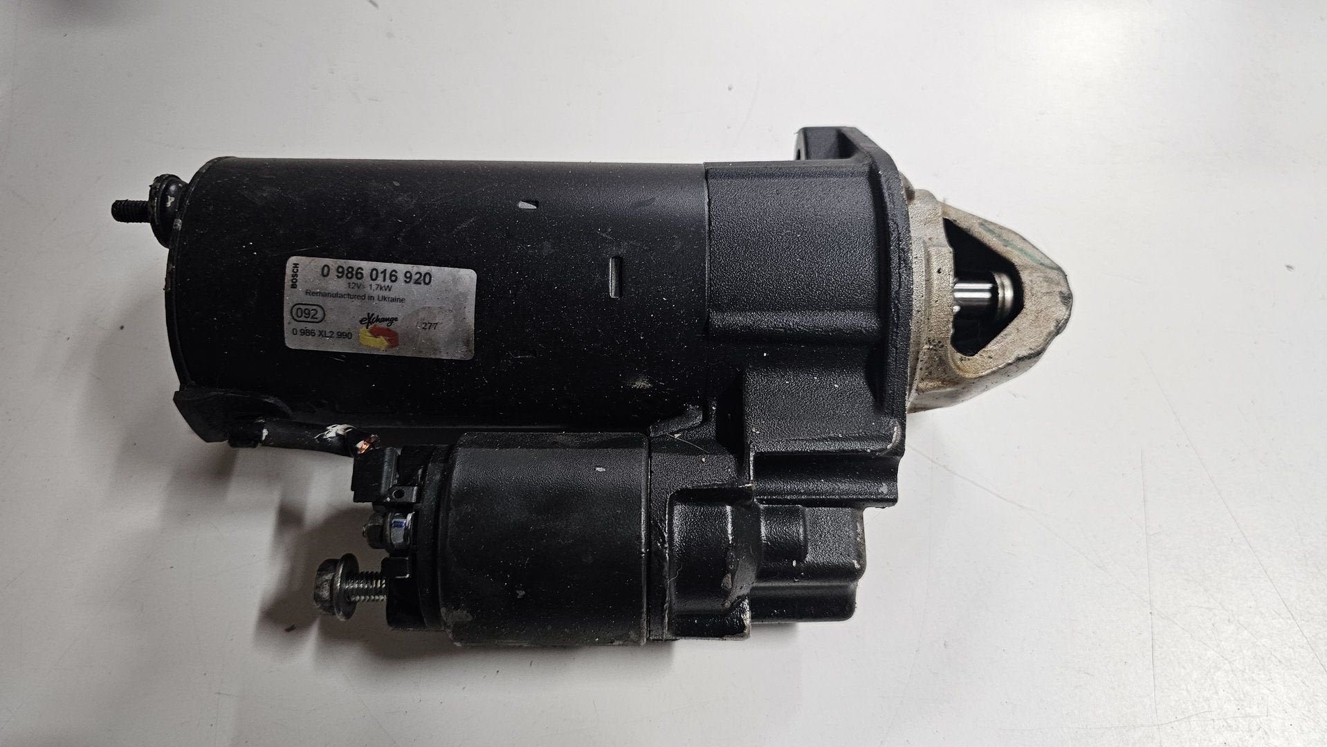 Startmotor origineel Bosch exchange 1,7 KW BMW 5 / 7 / 8 / X, Gebruikt, -, -, Ophalen of Verzenden