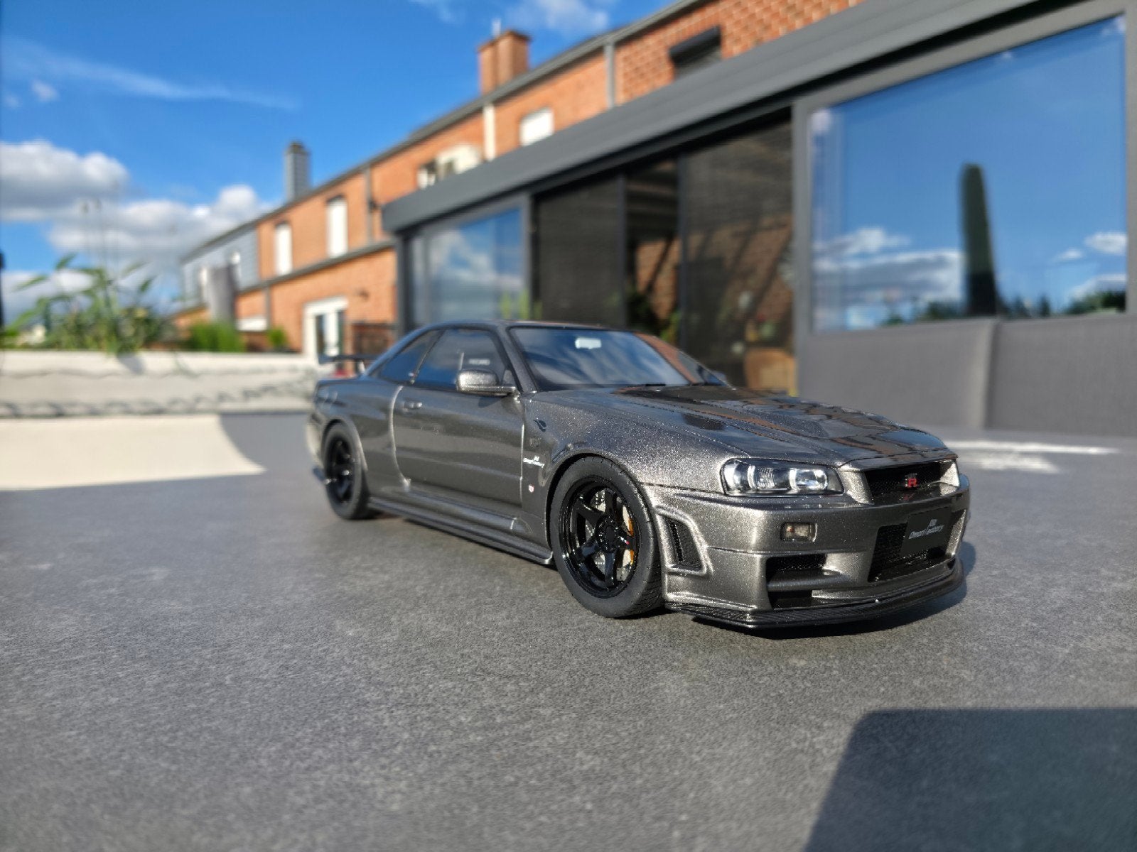Ottomobile G103 Nissan Skyline GT-R R34 gun metal, Ophalen of Verzenden, Nieuw, Auto, OttOMobile