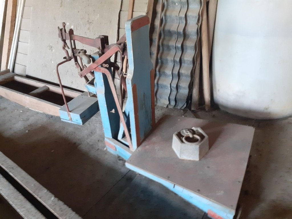 Oude bascuul met gewicht, Ophalen