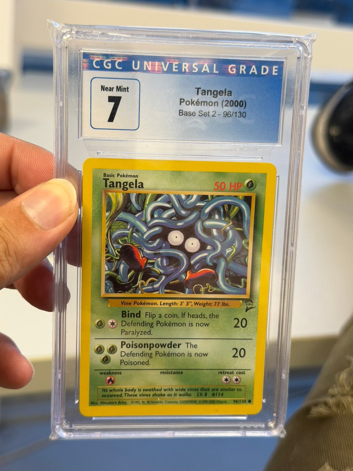 Pokémon Tangela 96/130 Base Set 2 2000 CGC 7 Vintage #96, Ophalen of Verzenden, Zo goed als nieuw, Losse kaart, Foil