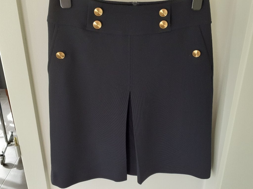 GIGUE Pikzwarte rok met springplooi   Maat 36   Prijs: € 7, Vêtements | Femmes, Gigue, Enlèvement ou Envoi, Comme neuf, Noir