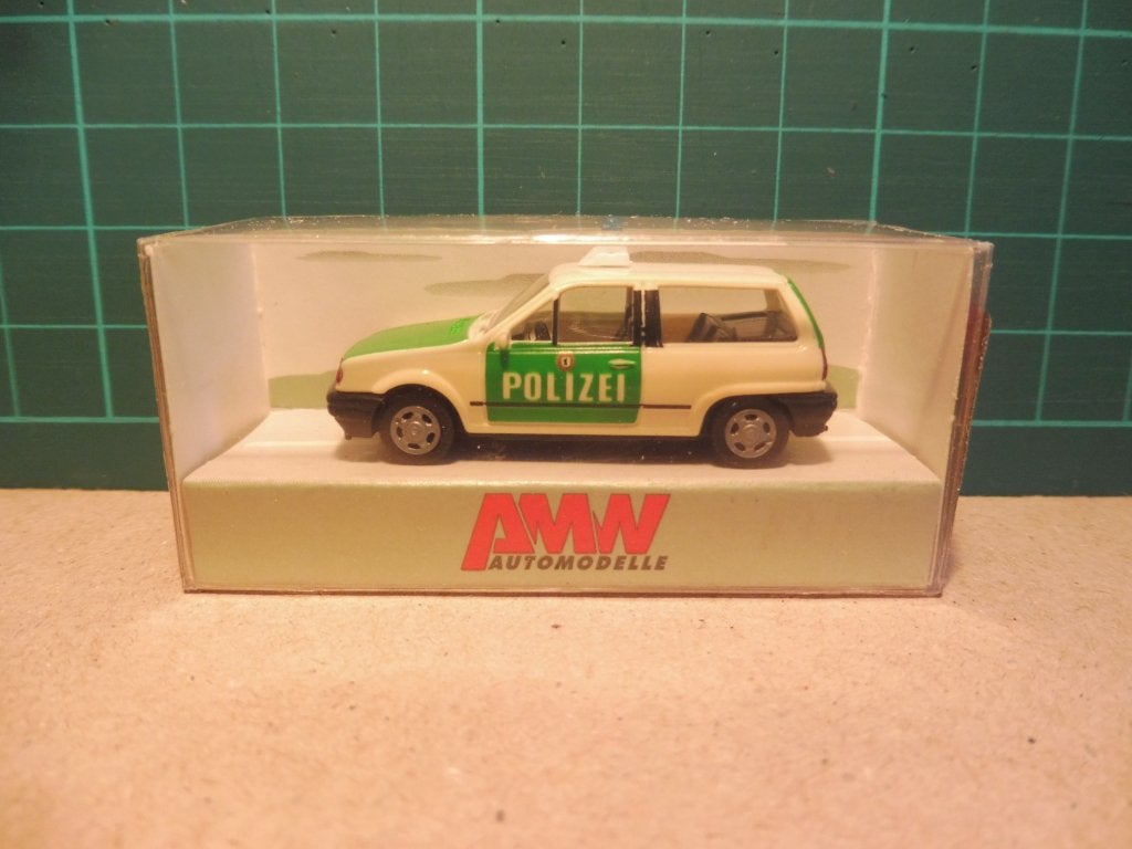 1:87 AMW 0041-1 VW Volkswagen Polo 86C 1981-1994 Polizei, Hobby en Vrije tijd, Ophalen of Verzenden, Zo goed als nieuw, Auto, AWM