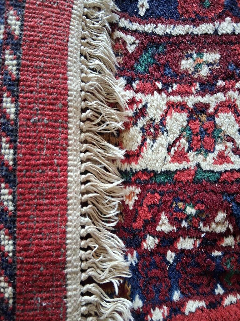 Tapis oriental persan antique, Enlèvement