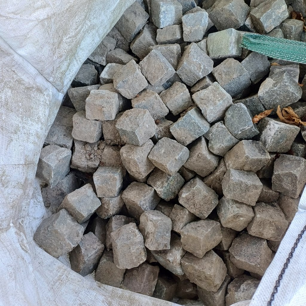 Kinderkopjes kasseien, Ophalen