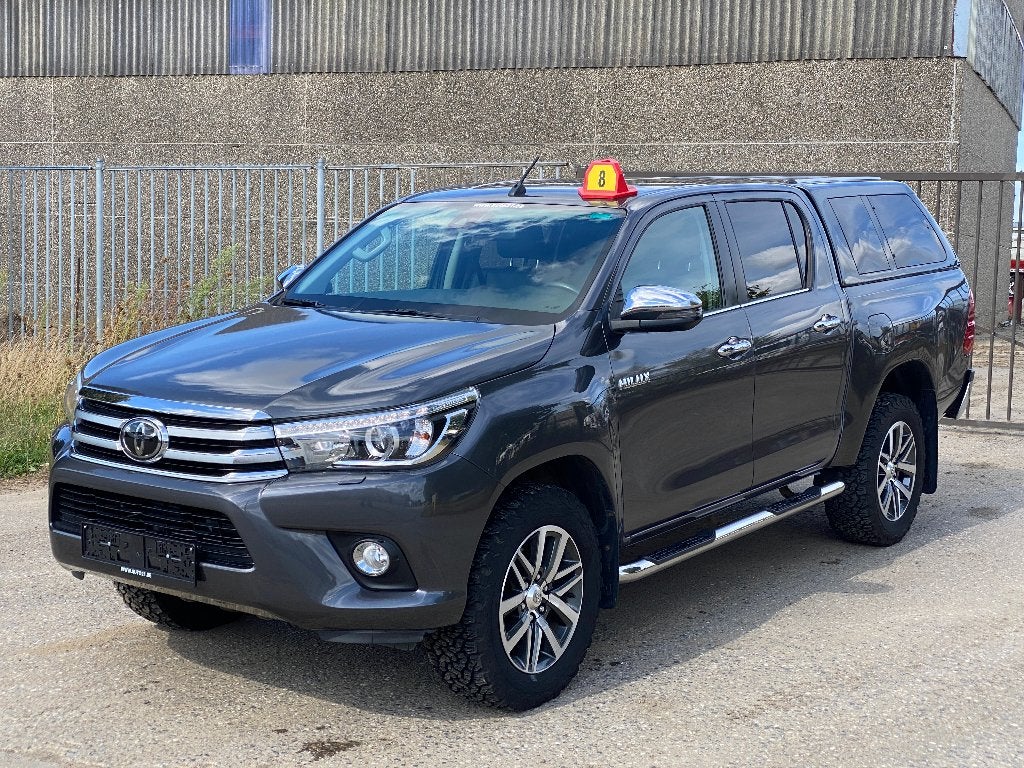 Toyota Hilux 2.4 D-4D 4WD Lounge, Autos, Cuir, Argent ou Gris, Achat, Entreprise