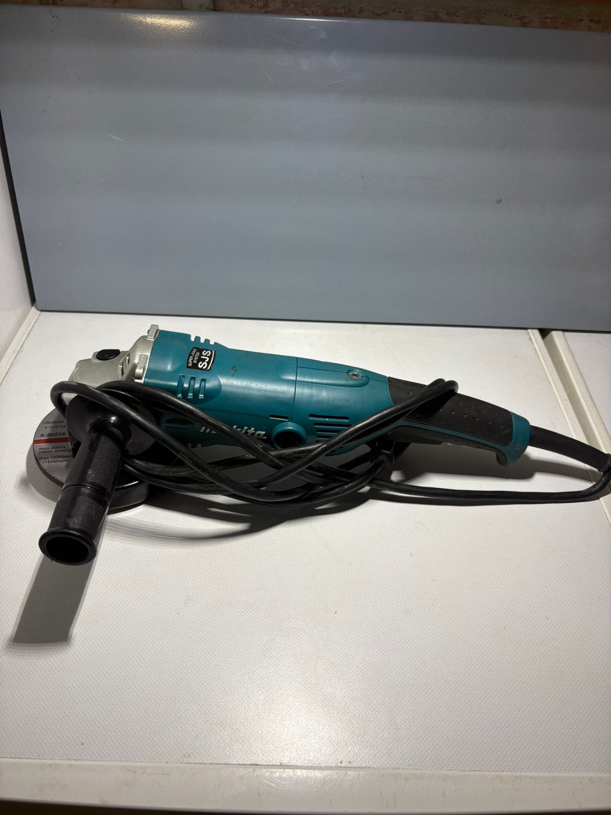 Makita haakse slijper 125mm 1450W, Doe-het-zelf en Bouw, Ophalen of Verzenden, Gebruikt