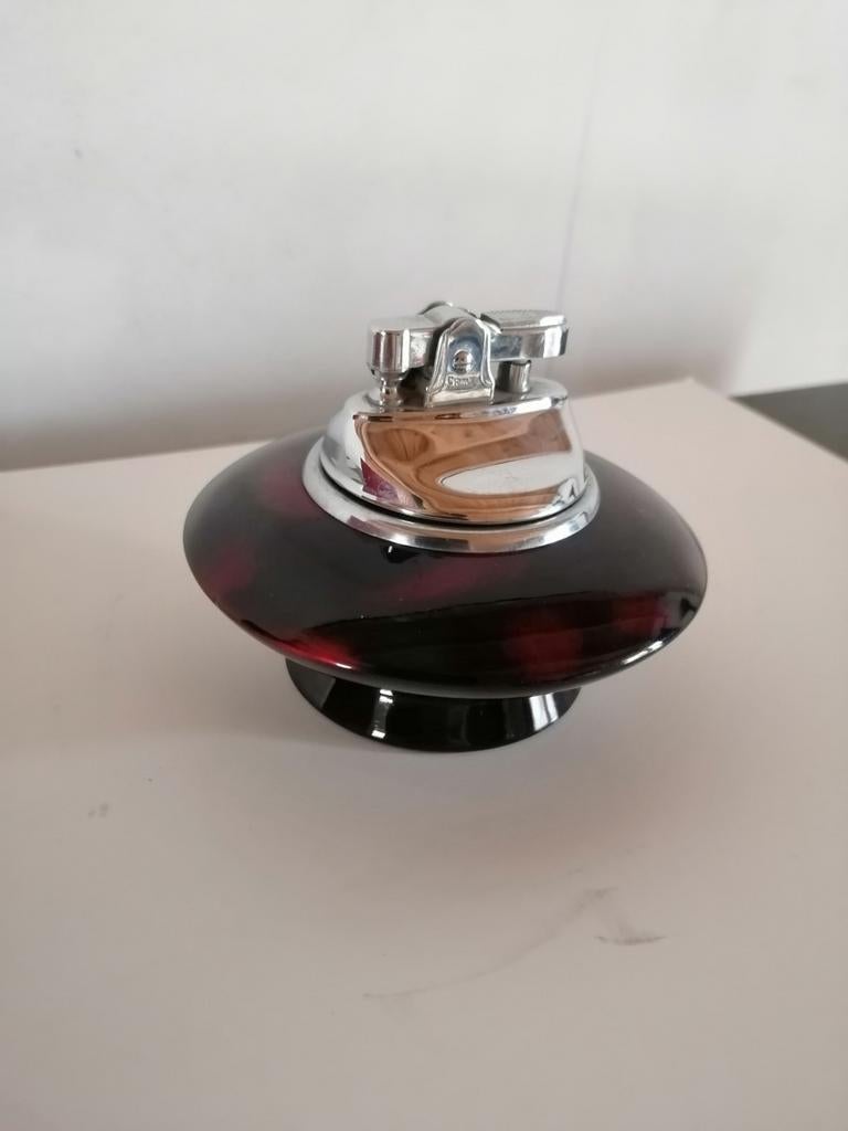 Ancien briquet soucoupe, Enlèvement