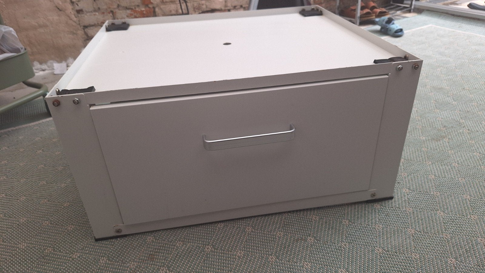wasmachine verhoger, Ophalen