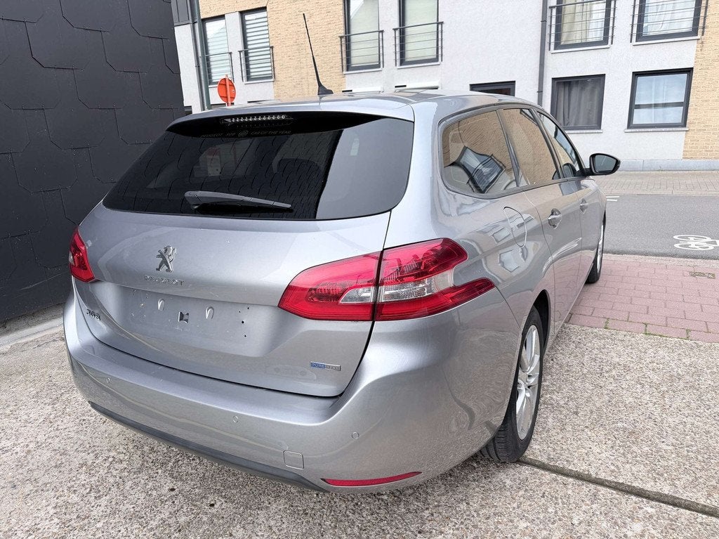 Peugeot 308 SW 1.2 EDITION SYLE | AIRCO | NAVI | CRUISE, Auto's, Stof, Gebruikt, Bedrijf, 3 cilinders