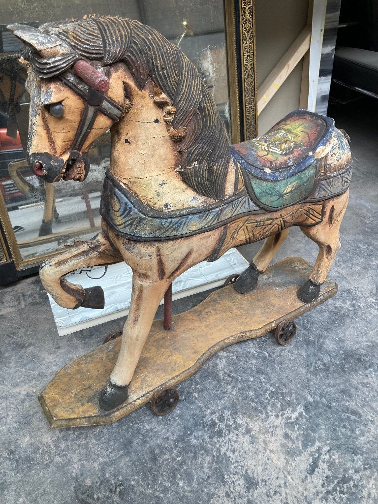 Antiek speelgoedpaardje, Ophalen