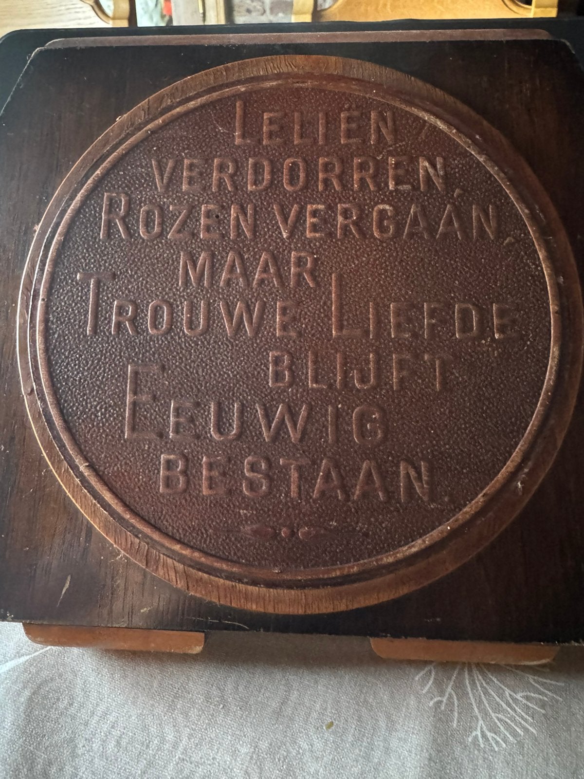 Mooie spreuk in hout, Ophalen