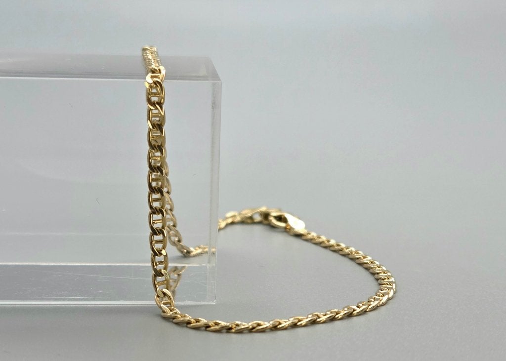 Vintage gouden valkenoog schakel armband. 2026/657, Ophalen of Verzenden, Zo goed als nieuw, Goud, Goud