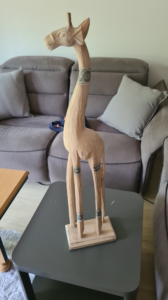 Giraf beeld, Ophalen