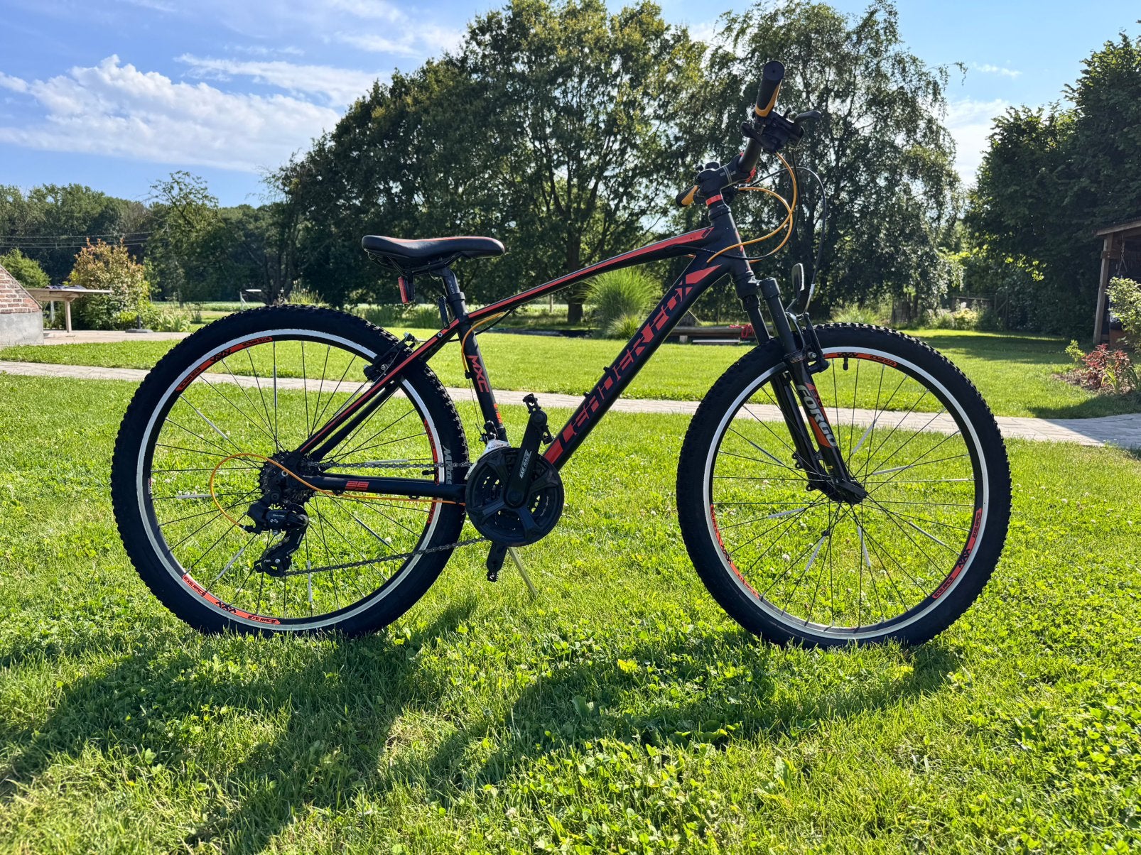 VTT noir/orange cadre, roues26 pouces.7x3 vitesses, Enlèvement, Comme neuf