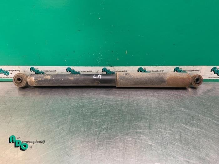 Schokdemper links-achter van een Daihatsu Cuore (Cuore 03-), Auto-onderdelen, Gebruikt, Daihatsu, -, -