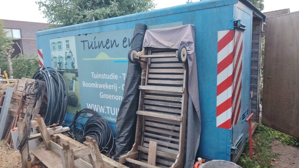 Container  voor haaksysteem, Enlèvement
