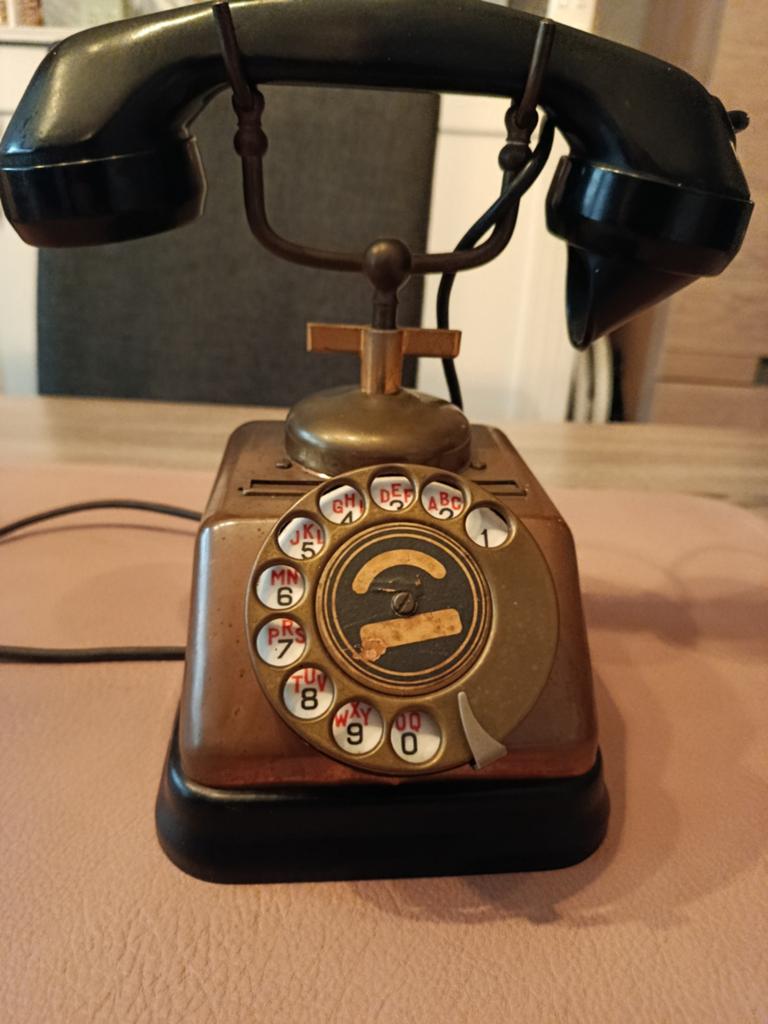 Oude koperen telefoon, Ophalen