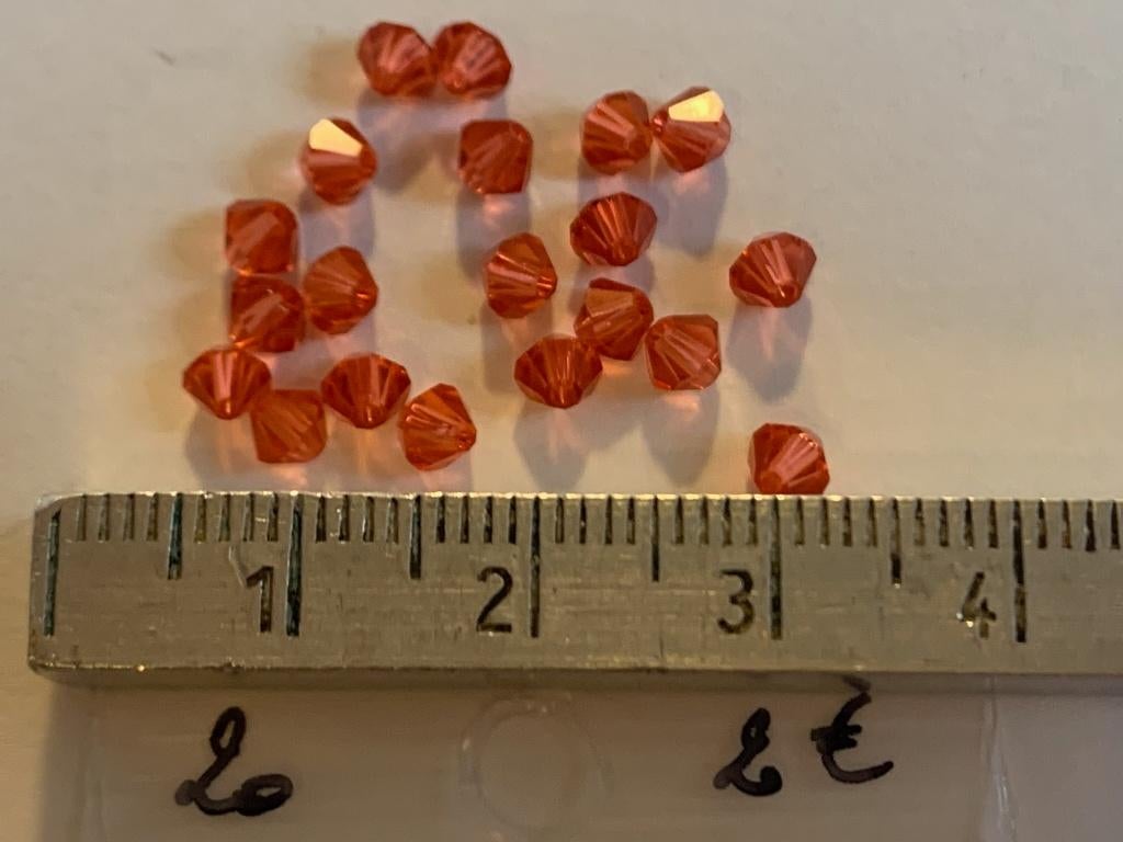 20 Swarovski tolletjes transparant rozerood, Ophalen of Verzenden, Nieuw, Kraal