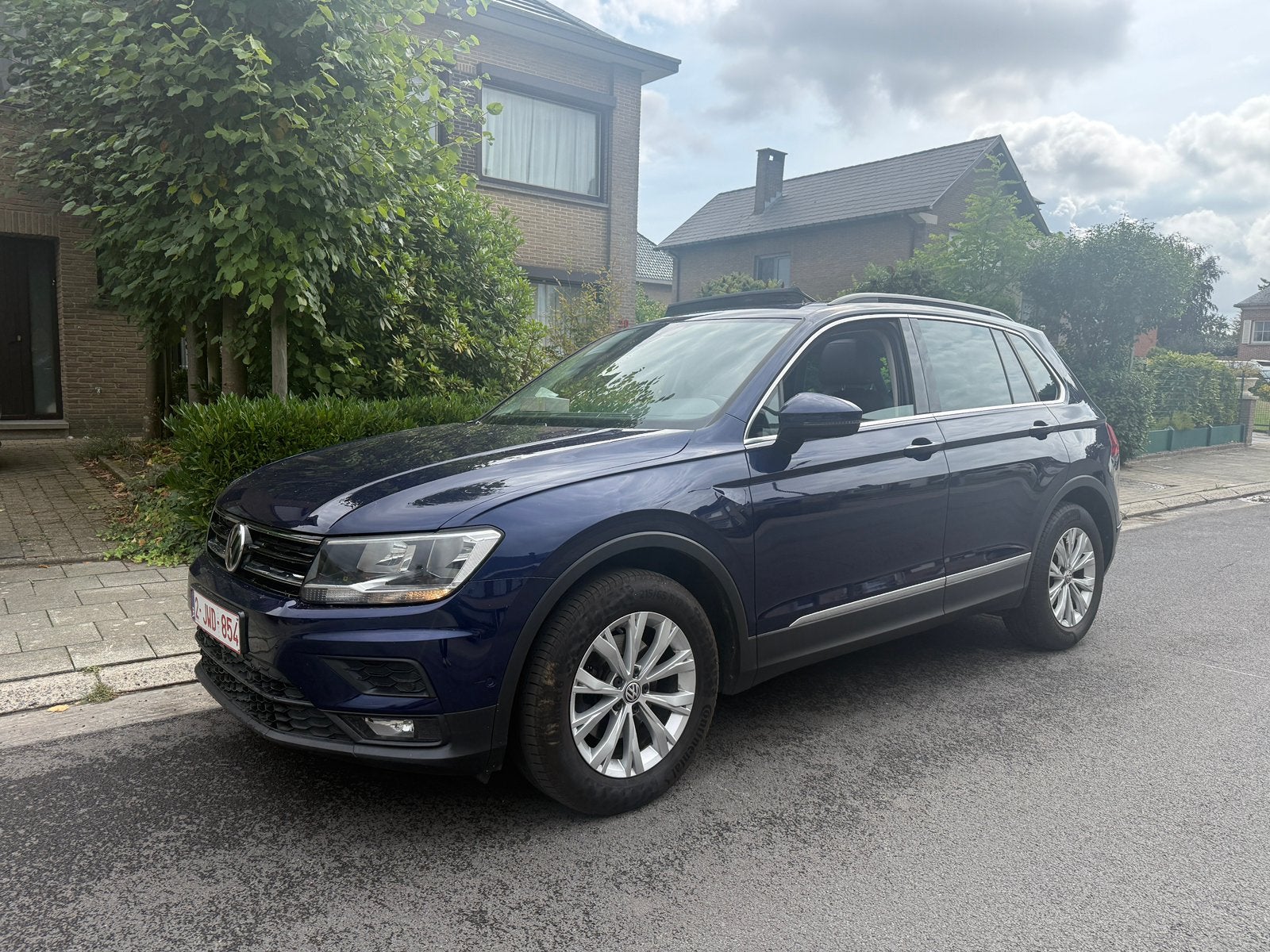 Volkswagen Tiguan 2.0 TDI Highline Euro6, Auto's, Volkswagen, Voorwielaandrijving, 4 cilinders, Blauw, Leder