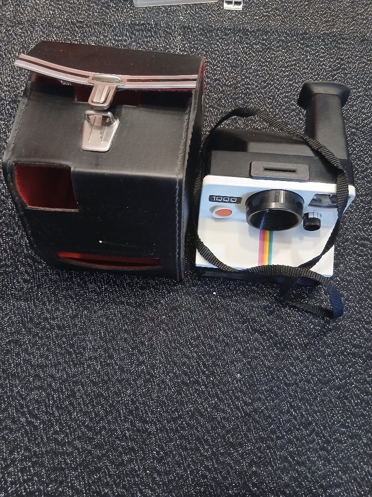 Polaroid 1000 +etui,vintage, Audio, Tv en Foto, Fotocamera's Analoog, Ophalen of Verzenden, Gebruikt, Polaroid, Polaroid
