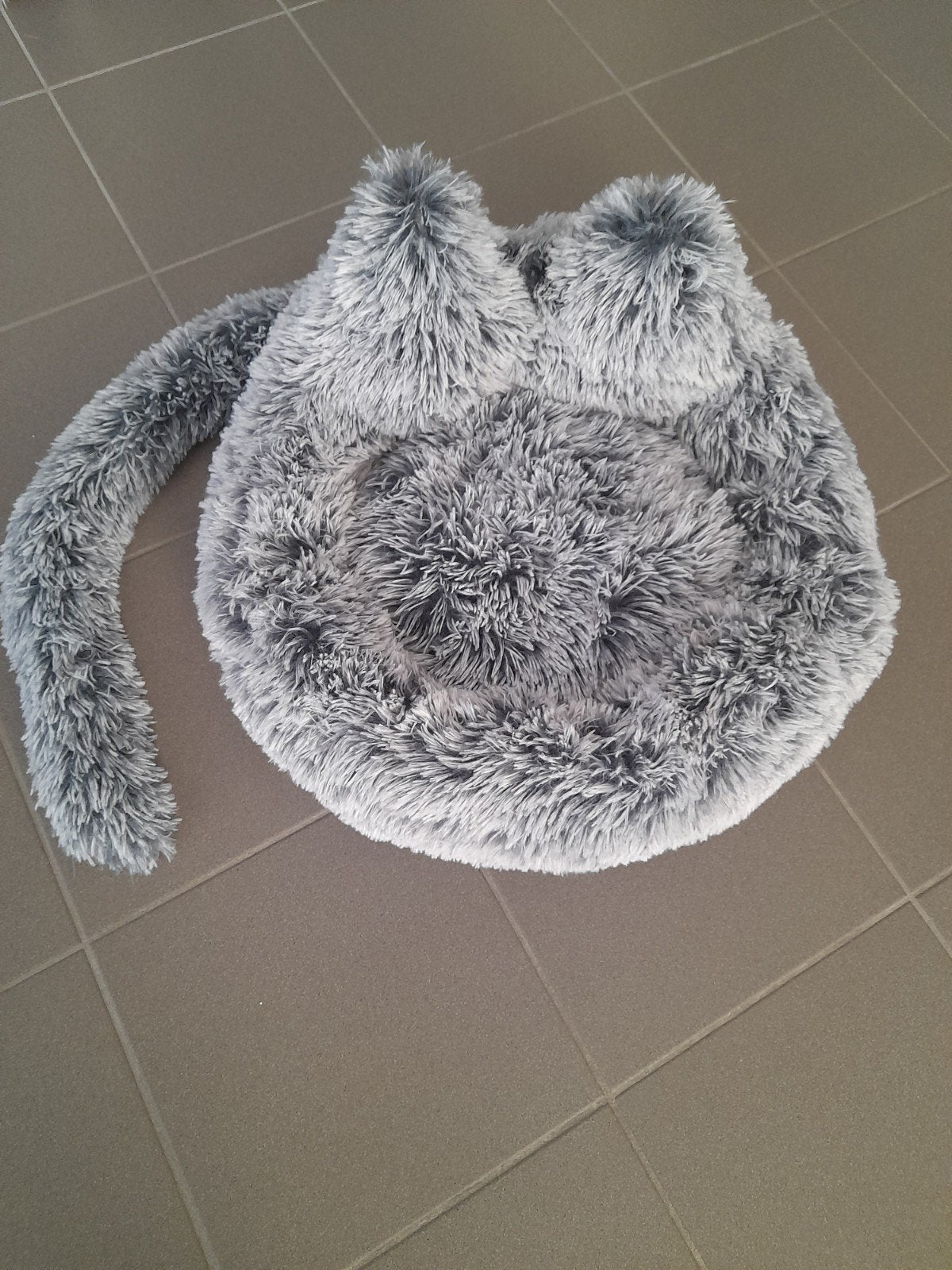 Kattenmand, Ophalen