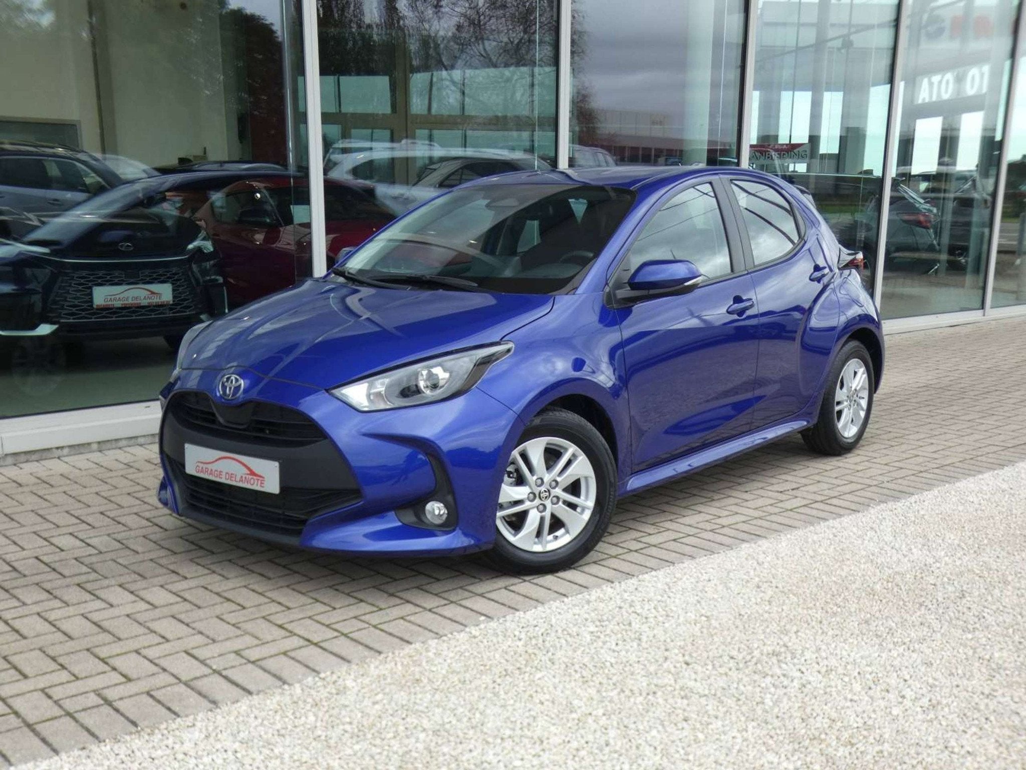 Toyota Yaris Hybrid Dynamic +Apple carplay +Android auto +Pa, Stof, Gebruikt, Adaptive Cruise Control, https://public.car-pass.be/vhr/123456789123456?lang=nl