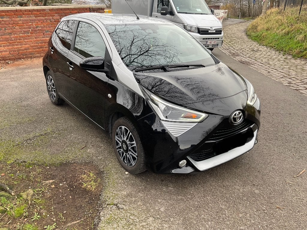 Toyota aygo série spéciale 65000km. Full., Autos, Cuir, Achat, Boîte manuelle, Noir