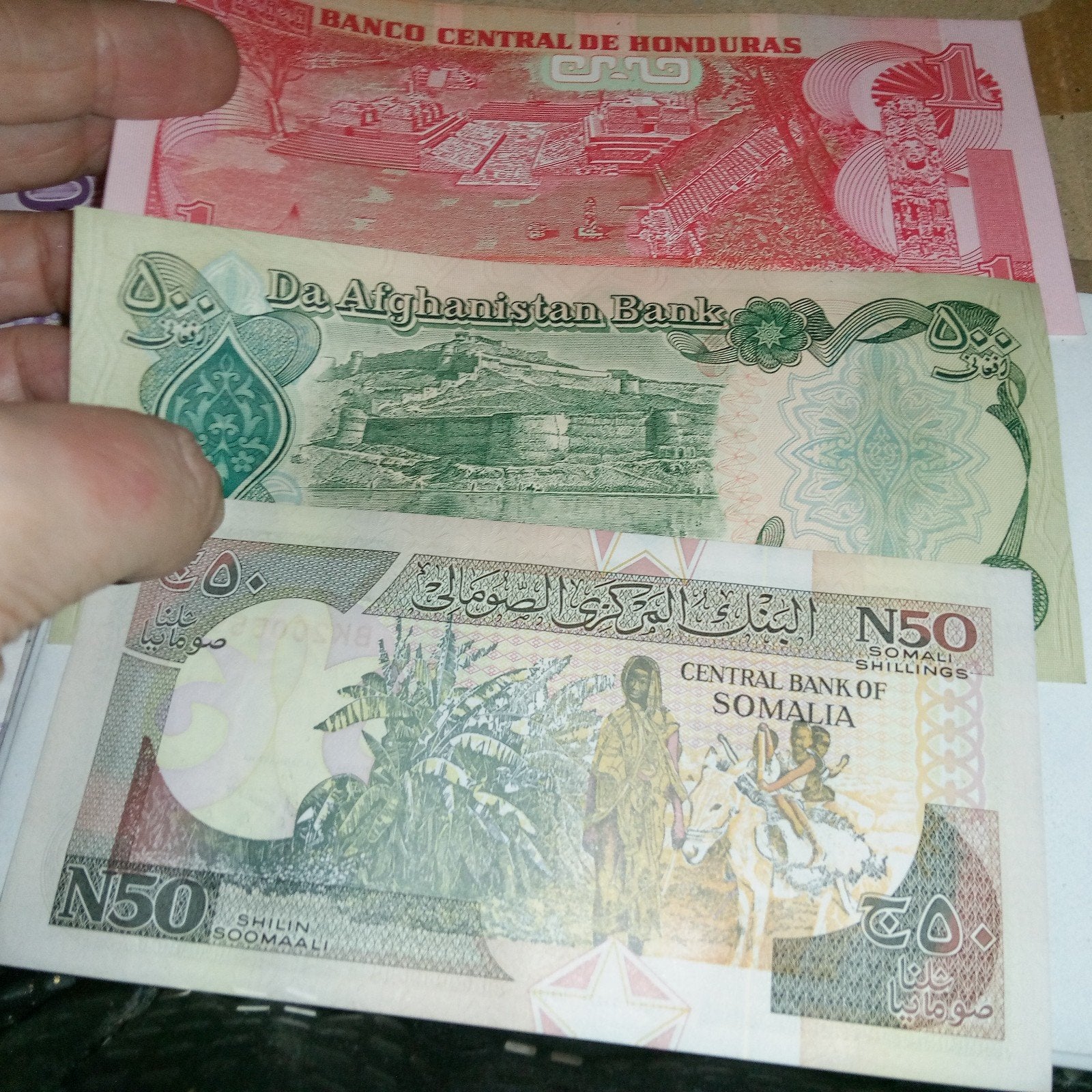 3 magnifiques billets de banque d'Afghanistan, de Somalie et, Enlèvement ou Envoi, Série