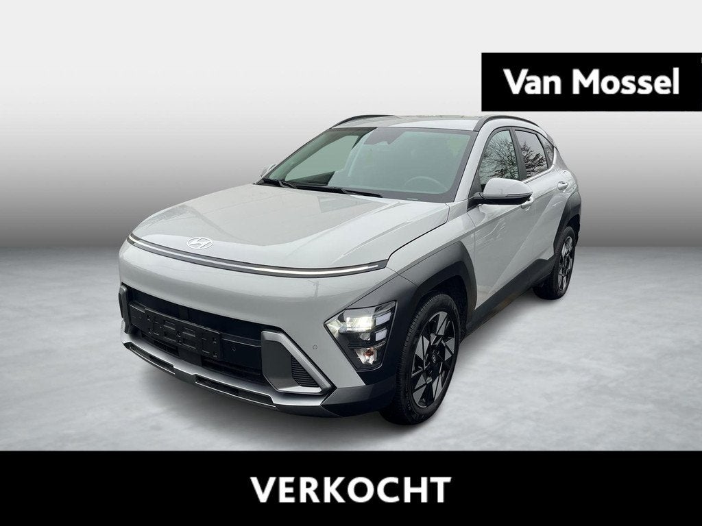 Hyundai Kona 1.6 GDi Hybrid Feel 6-DCT GARANTIE tot 09/2029, Auto's, Hyundai, Stof, Gebruikt, Zwart, 4 cilinders