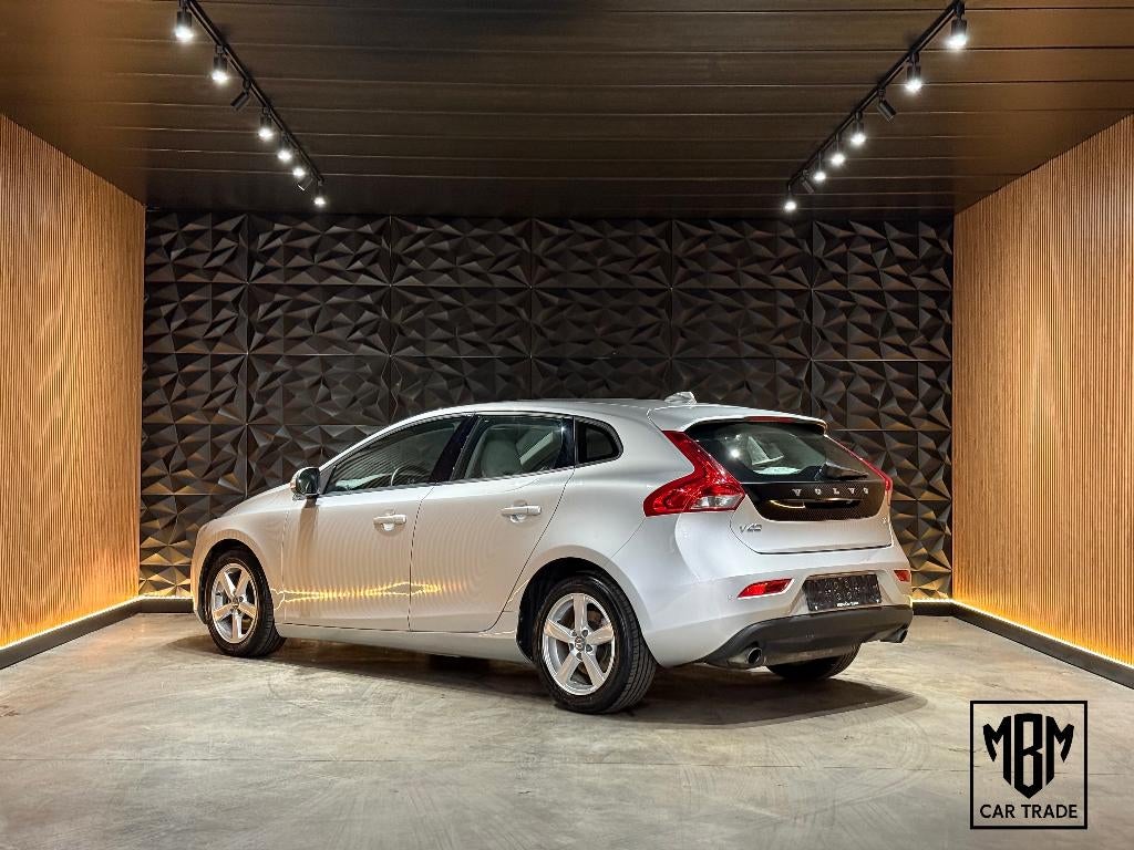 ✅ Volvo V40 1.6 T3 GARANTIE Airco Leder Zetelverw Navi PDC, Autos, Volvo, Cuir, Achat, Entreprise, Boîte manuelle