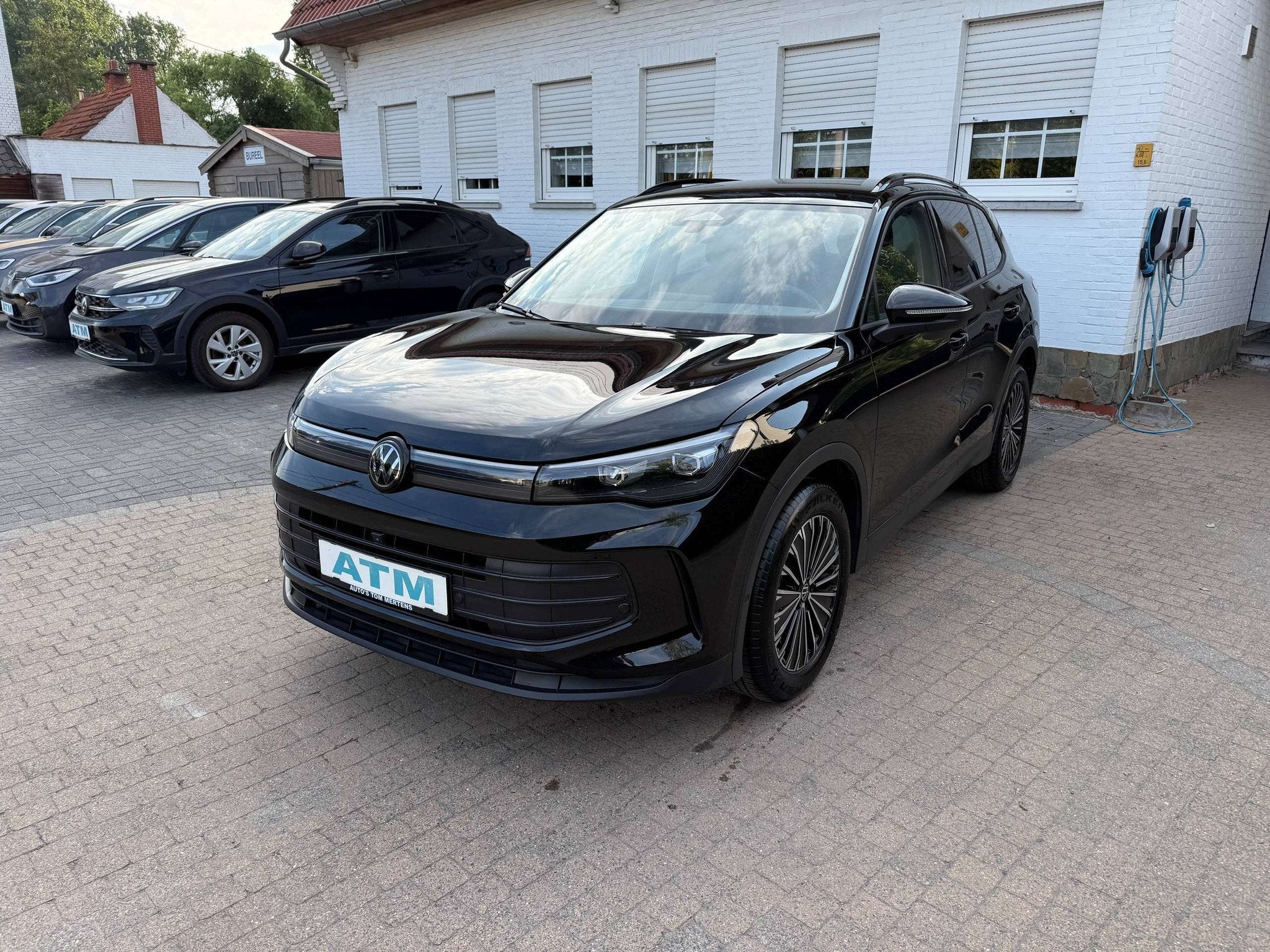 Volkswagen Tiguan Tiguan 1.5 eTSI mHEV ACT BLACK EDITION OPF, Auto's, Zwart, 4 cilinders, Zwart, 5 zetels