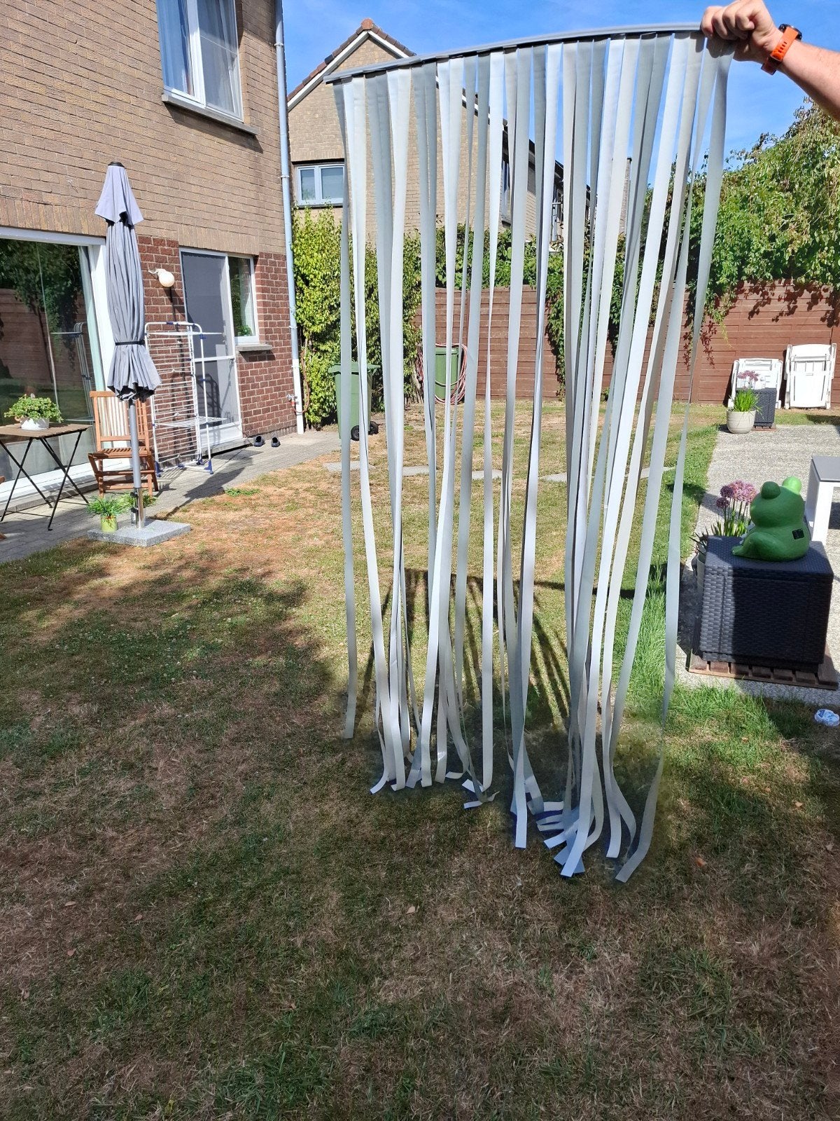 vliegengordijn, Ophalen