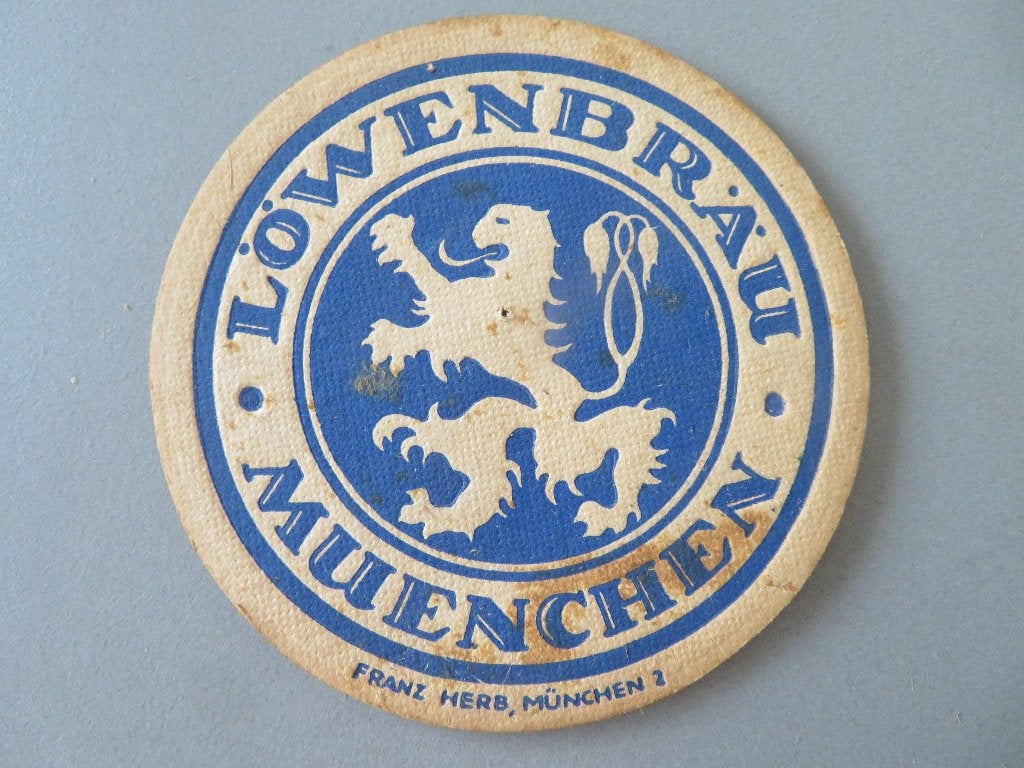 oud bierviltje Löwenbrau Expo 58 Au Bon Marché Bruxelles, Enlèvement ou Envoi, Comme neuf, Sous-bock, Autres marques