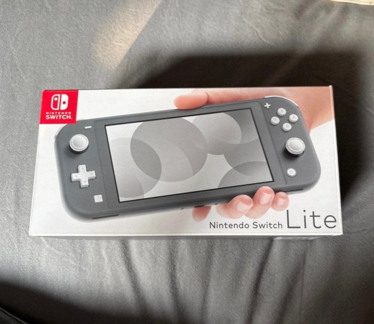 Switch Lite dans une boîte Nintendo, Enlèvement ou Envoi, Utilisé